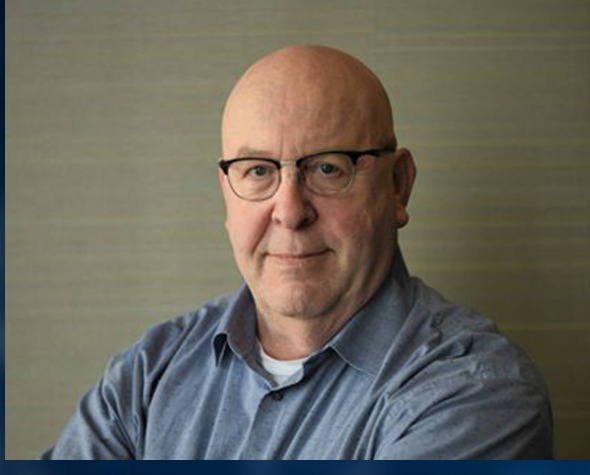 Portrait of Kevin Comstock